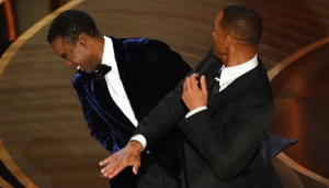 Smith l-a pălmuit pe Chris Rock