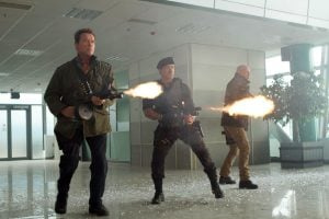   TROŠKI 2, z leve: Arnold Schwarzenegger, Sylvester Stallone, Bruce Willis