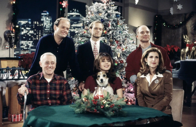  FRASIER, sedící, zleva: John Mahoney, Jane Leeves, se psem Eddiem, Peri Gilpin; stojící zleva: Kelsey Grammer, David Hyde Pierce, Dan Butler, 1993-2004
